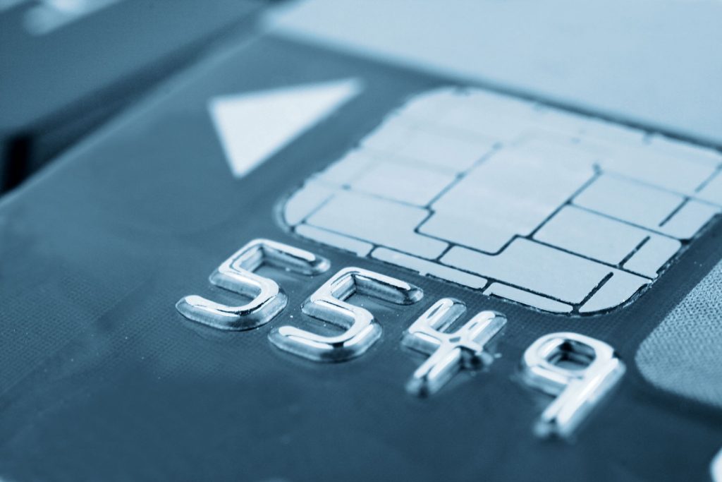 An up close photo of a credit card chip