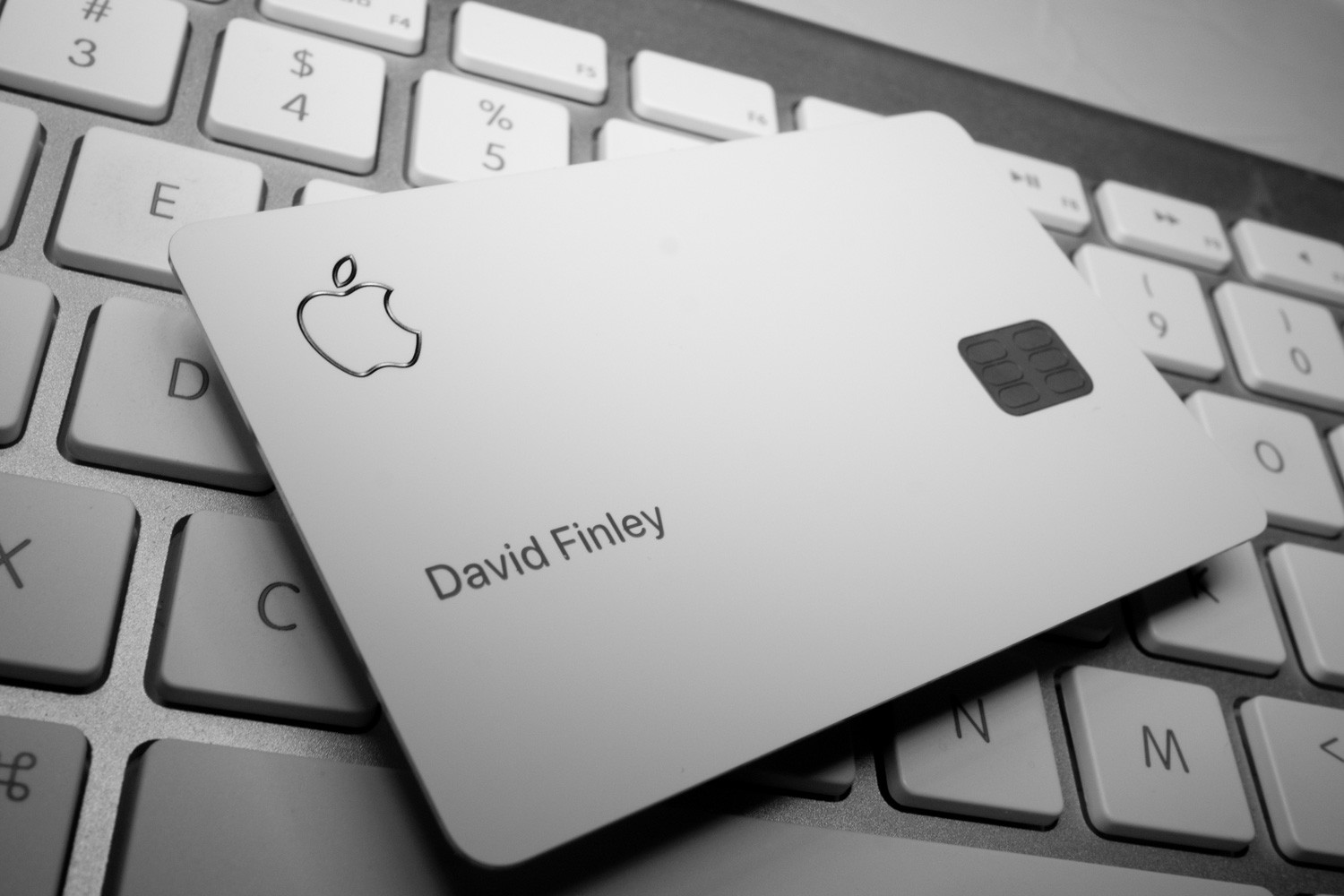 Physical Apple Mastercard Credit Card backed by Goldman Sachs on an Apple keyboard.